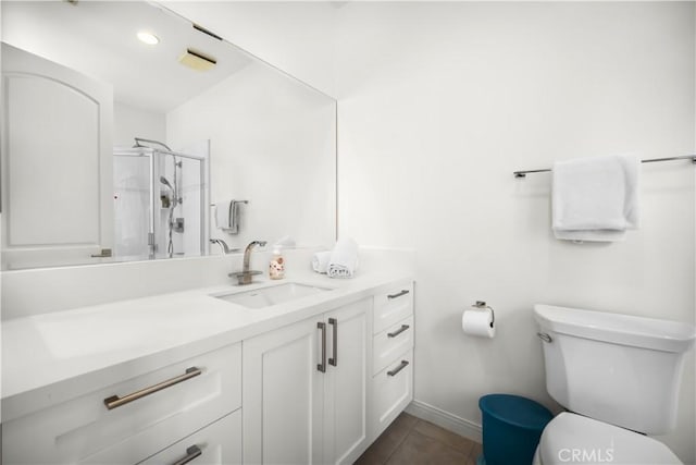 5366 Collingwood Cir, Calabasas, CA 91302 - full bathroom featuring vanity, a shower stall, toilet, and baseboards