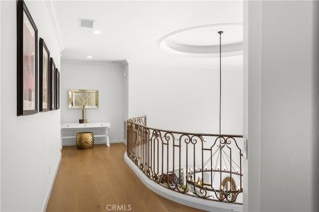 5366 Collingwood Cir, Calabasas, CA 91302 - hallway featuring ornamental molding, wood finished floors, baseboards, recessed lighting, and an upstairs landing