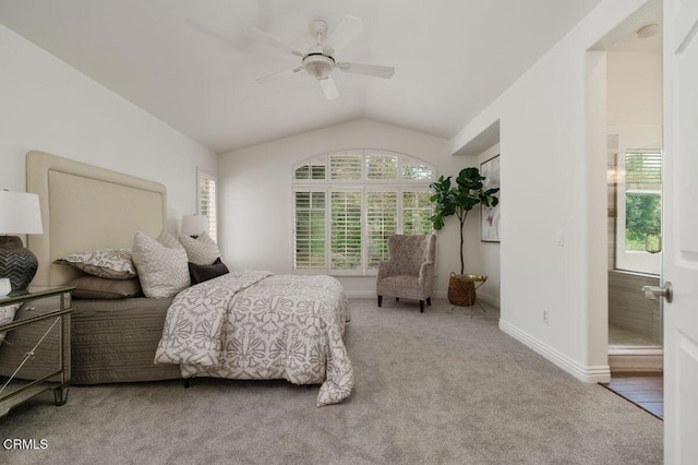 bedroom featuring vaulted ceiling, baseboards, a ceiling fan, and carpet flooring