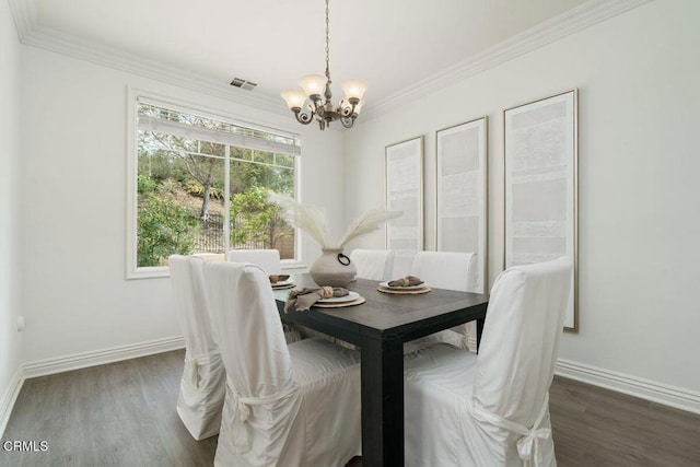 dining room featuring an inviting chandelier, baseboards, dark wood-type flooring, and visible vents