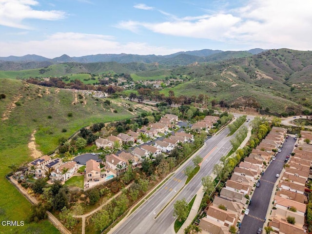bird's eye view with a residential view and a mountain view