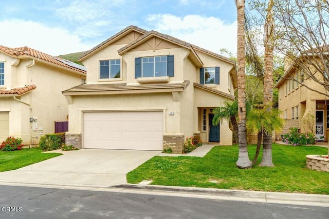 view of front of property featuring a tile roof, a front yard, concrete driveway, an attached garage, and stucco siding