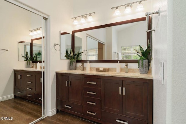 570 Shadow Ln, Simi Valley, CA 93065 - full bath featuring vanity, wood finished floors, and baseboards