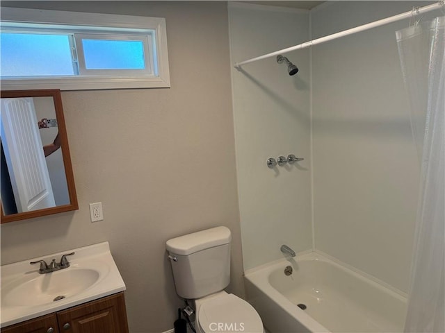 bathroom featuring toilet, vanity, and shower / tub combo with curtain