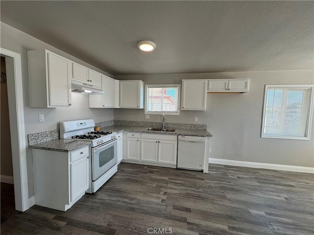 kitchen featuring a sink, baseboards, white cabinetry, white appliances, and under cabinet range hood