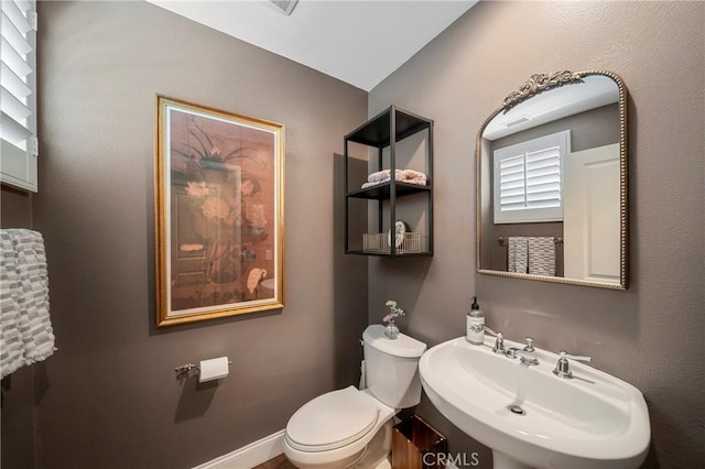 132 Carrotwood, Irvine, CA 92618 - bathroom with toilet and a sink