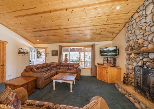living area with lofted ceiling, wooden ceiling, a stone fireplace, and carpet