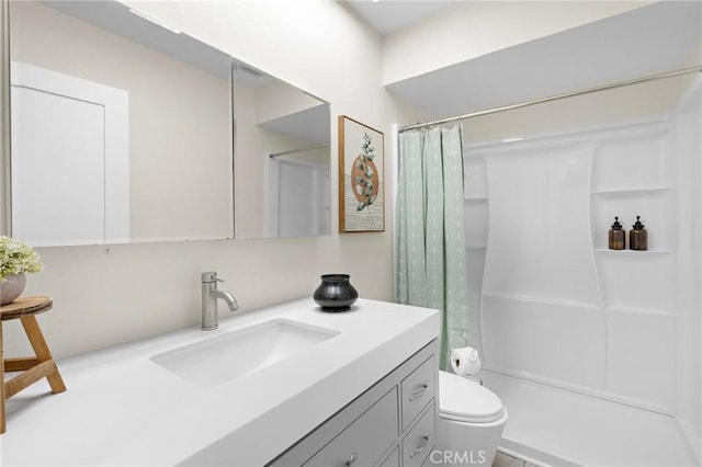 5367 Algarrobo Unit C, Laguna Woods, CA 92637 - bathroom with vanity, toilet, and a shower with shower curtain