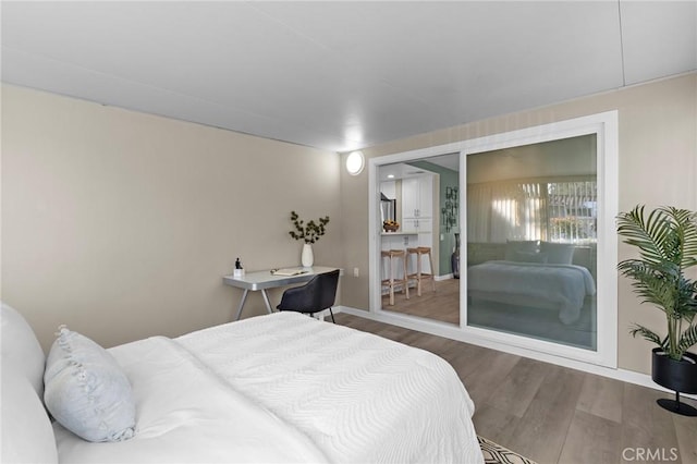 5367 Algarrobo Unit C, Laguna Woods, CA 92637 - bedroom featuring wood finished floors and baseboards