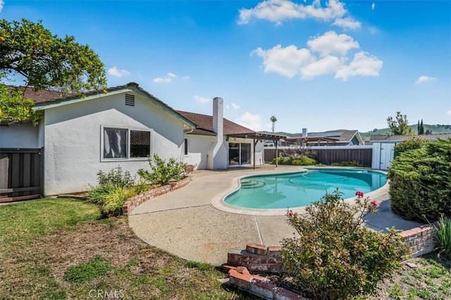 6304 Tamarind St, Oak Park, CA 91377 - view of pool with a pergola, a fenced backyard, a fenced in pool, and a patio