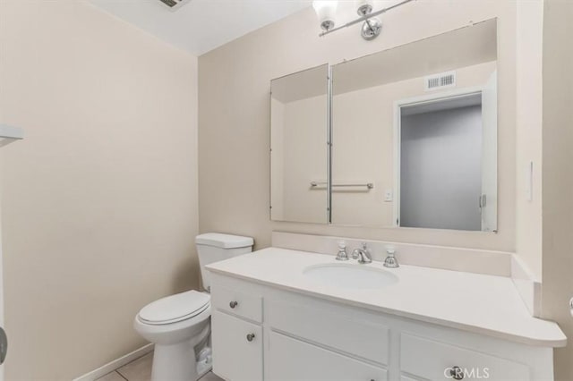 6304 Tamarind St, Oak Park, CA 91377 - half bath featuring visible vents, tile patterned floors, vanity, and toilet