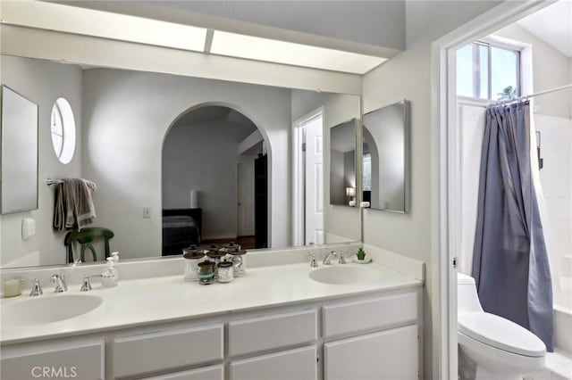312 Barrington Cir, Redlands, CA 92374 - bathroom with double vanity and shower / tub combo