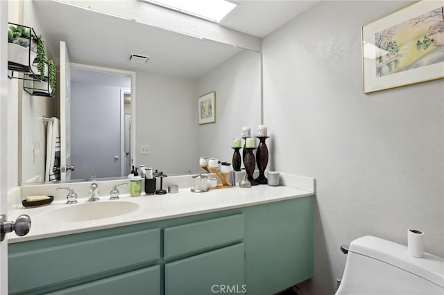 312 Barrington Cir, Redlands, CA 92374 - half bathroom featuring vanity and toilet