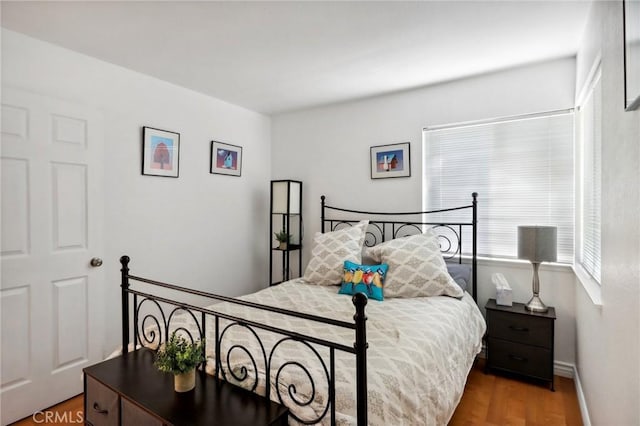 312 Barrington Cir, Redlands, CA 92374 - bedroom featuring wood finished floors and baseboards