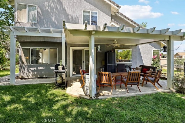 312 Barrington Cir, Redlands, CA 92374 - back of house with stucco siding, ceiling fan, and a pergola