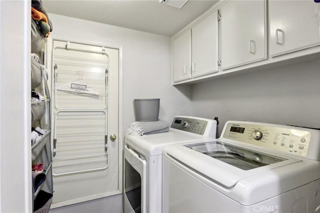 312 Barrington Cir, Redlands, CA 92374 - laundry area with cabinet space and washing machine and clothes dryer
