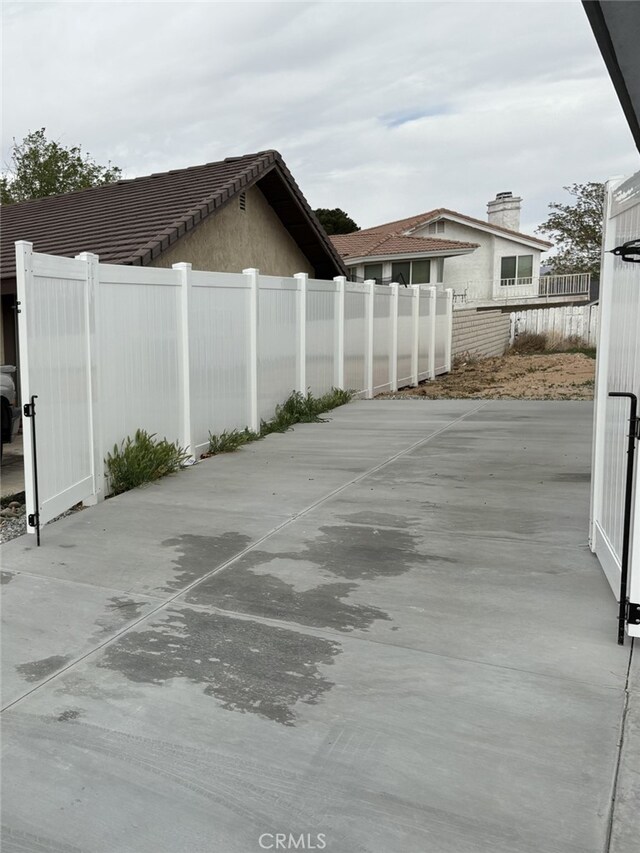 12525 Spring Valley Pkwy, Victorville, CA 92395 - view of patio featuring fence