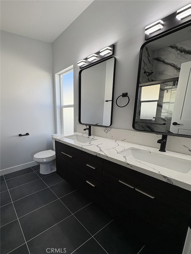 12525 Spring Valley Pkwy, Victorville, CA 92395 - bathroom with a shower stall, toilet, a sink, and double vanity