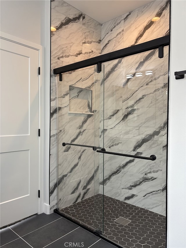 12525 Spring Valley Pkwy, Victorville, CA 92395 - bathroom with tile patterned floors and a marble finish shower
