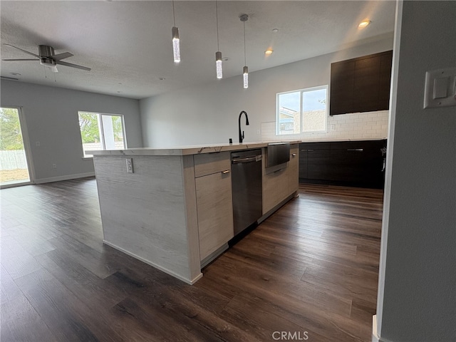 12525 Spring Valley Pkwy, Victorville, CA 92395 - kitchen with modern cabinets, dishwasher, a kitchen island with sink, and dark wood-style floors