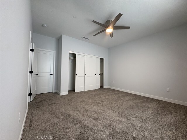 12525 Spring Valley Pkwy, Victorville, CA 92395 - unfurnished bedroom with baseboards, a closet, visible vents, and carpet
