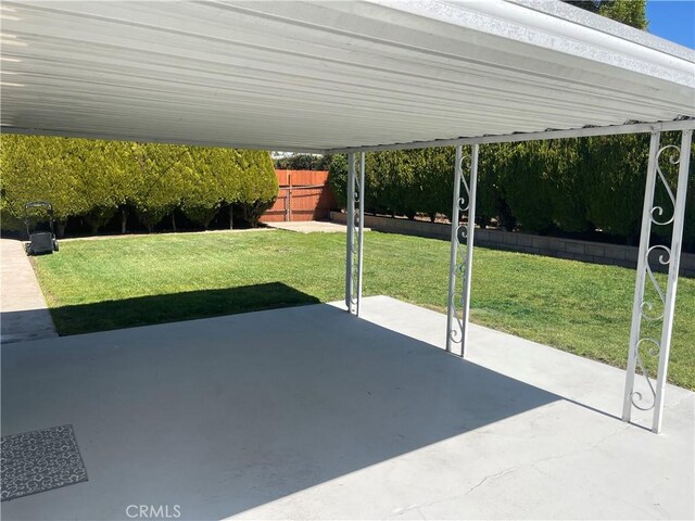 view of patio / terrace featuring fence