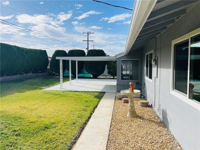 view of yard featuring a patio