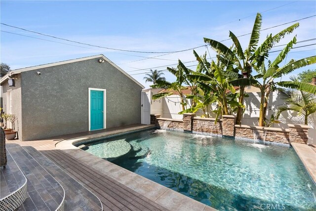 view of swimming pool with a fenced backyard and a fenced in pool