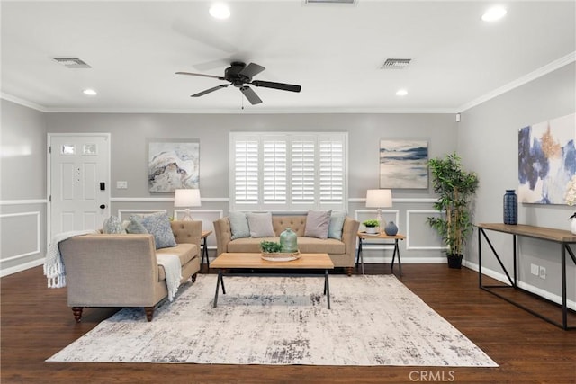living area featuring recessed lighting, visible vents, and ornamental molding