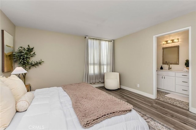 4164 Tujunga Ave Unit 102, Studio City, CA 91604 - bedroom with wood finished floors and connected bathroom