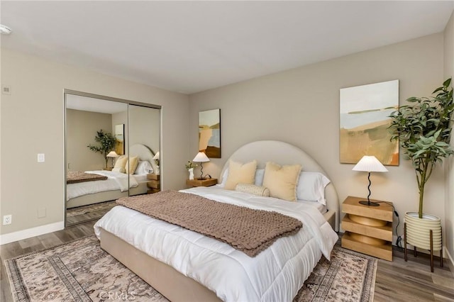 4164 Tujunga Ave Unit 102, Studio City, CA 91604 - bedroom featuring wood finished floors and a closet