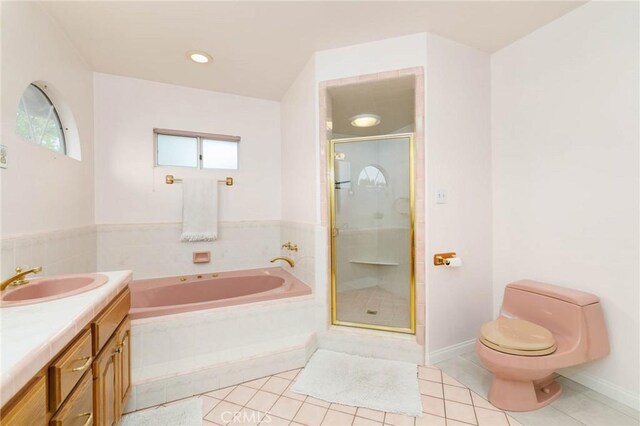 162 Acacia Ave, Monrovia, CA 91016 - full bath with tile patterned floors, a bath, a stall shower, and vanity