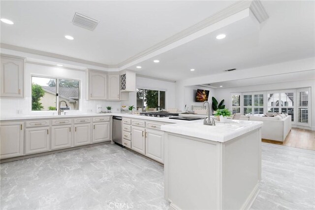 162 Acacia Ave, Monrovia, CA 91016 - kitchen with light countertops, open floor plan, recessed lighting, light marble finish floors, and a peninsula