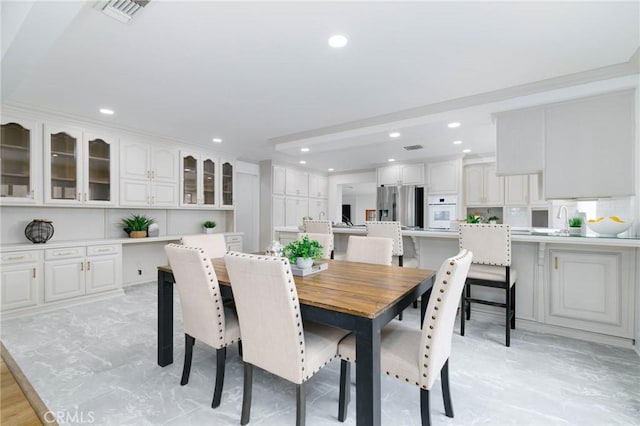 162 Acacia Ave, Monrovia, CA 91016 - dining room featuring recessed lighting and light marble finish floors