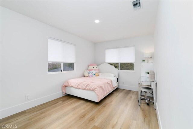 162 Acacia Ave, Monrovia, CA 91016 - bedroom with baseboards and light wood finished floors