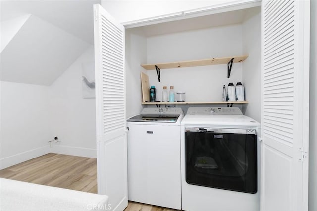 162 Acacia Ave, Monrovia, CA 91016 - laundry room with independent washer and dryer and light wood finished floors