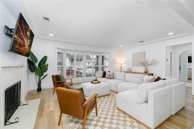 162 Acacia Ave, Monrovia, CA 91016 - living area with recessed lighting, a premium fireplace, and light wood-type flooring