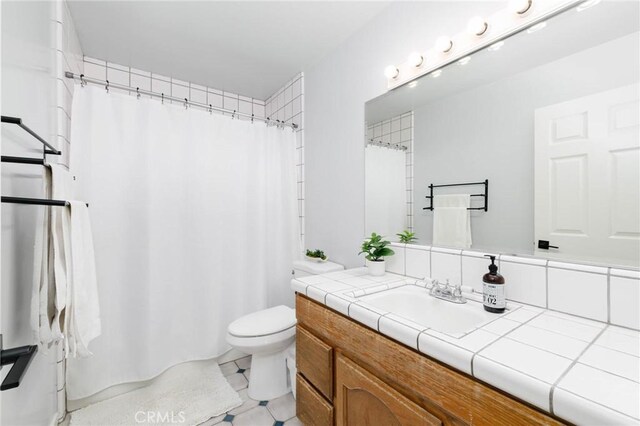 162 Acacia Ave, Monrovia, CA 91016 - bathroom with vanity and a shower with shower curtain