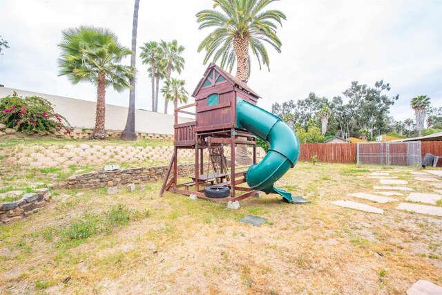 view of play area with fence