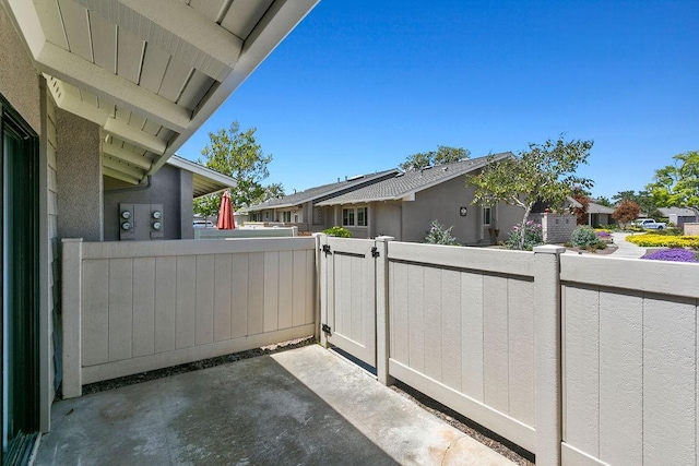exterior space featuring a gate and fence