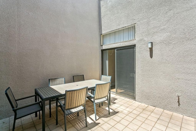view of patio with outdoor dining area