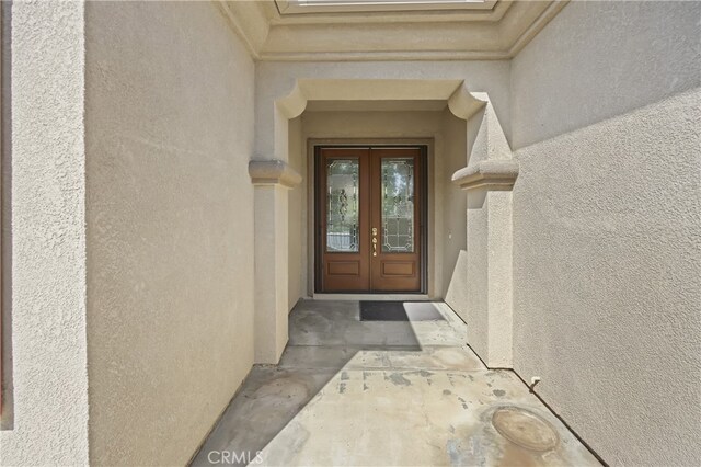 29427 Winding Brook Dr, Menifee, CA 92584 - entrance to property with french doors and stucco siding