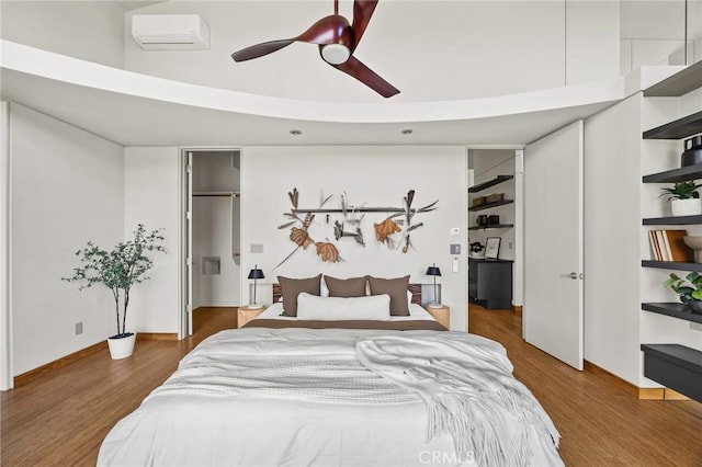 bedroom featuring a ceiling fan and wood finished floors