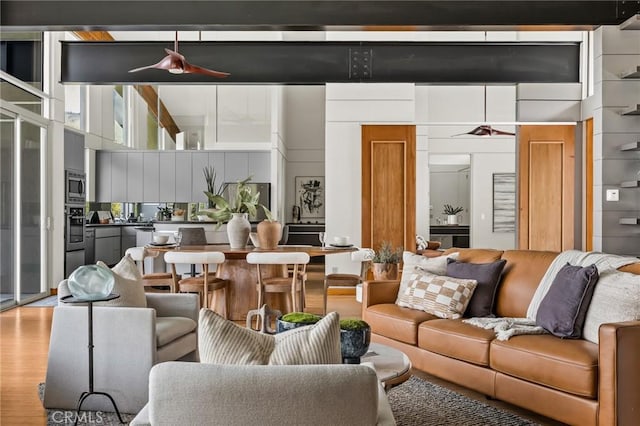 living room with wood finished floors
