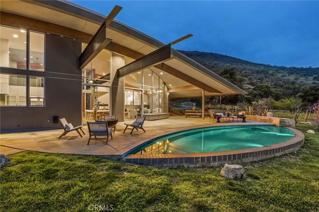 pool featuring a patio area