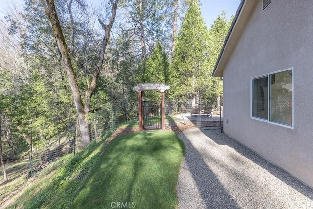 view of yard featuring fence