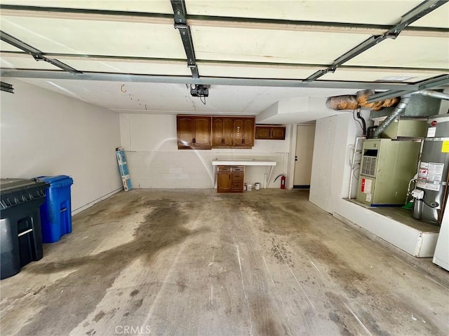 5444 Las Virgenes Rd, Calabasas, CA 91302 - garage with a garage door opener and heating unit