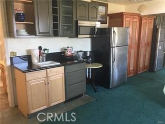 1150 Pacific Blvd, Oceano, CA 93445 - kitchen with dark countertops, appliances with stainless steel finishes, and a sink