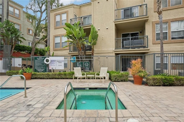 3408 Hathaway Ave Unit 301, Long Beach, CA 90815 - view of pool with a hot tub and a patio