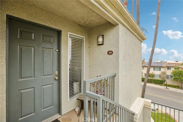 3408 Hathaway Ave Unit 301, Long Beach, CA 90815 - doorway to property with stucco siding